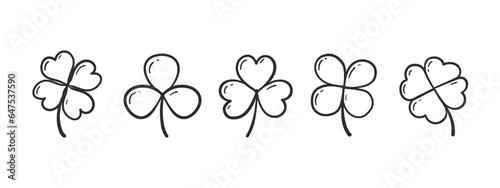 St.Patrick 's Day. in doodle style clover leaves.