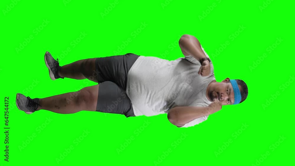 Slow motion of overweight Asian man boxing over green screen Slow motion of overweight Asian man boxing over green screen