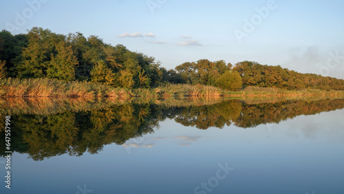 Fototapeta Naklejka Na Ścianę i Meble -  landscape. clouds are reflected in the river