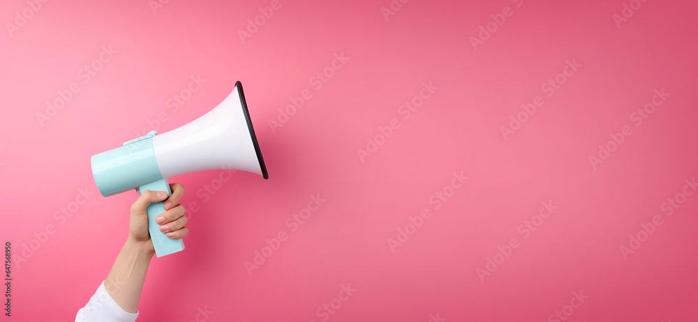 Megaphone in woman hand on a pink background. Copy space. Place for text. Generative AI - obrazy, fototapety, plakaty 