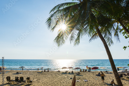 Fototapeta Naklejka Na Ścianę i Meble -  Beach chair on sea beach wave sunny day blue sky cloud sunset summer vacation