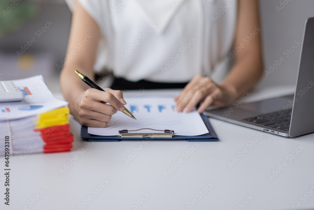 Fototapeta premium Businessman working at office with documents on his desk, doing planning analyzing the financial report, business plan investment, finance analysis concept 