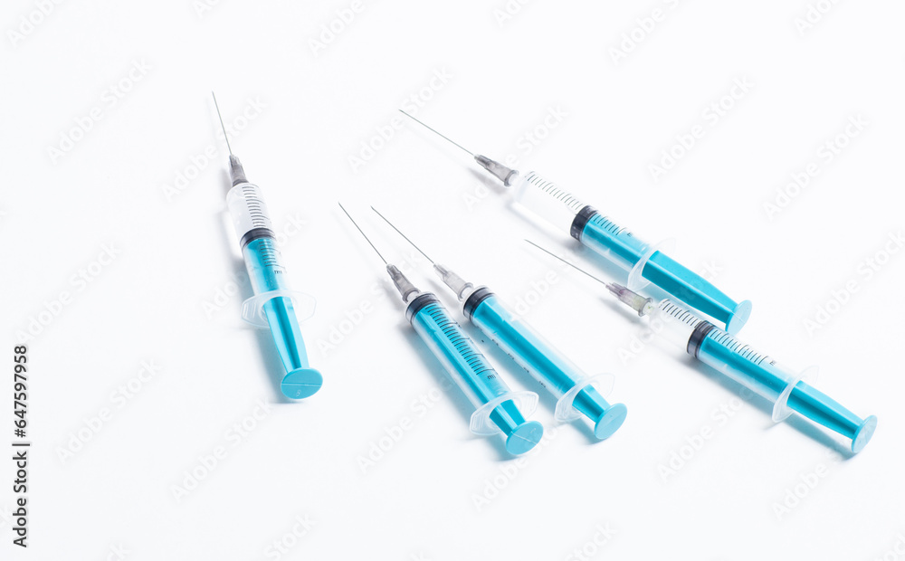 Disposable plastic syringe prepared for injection and vaccination in the hospital. The concept of medicine and health Disposable plastic syringe prepared for injection and vaccination in the hospital. The concept of medicine and health
