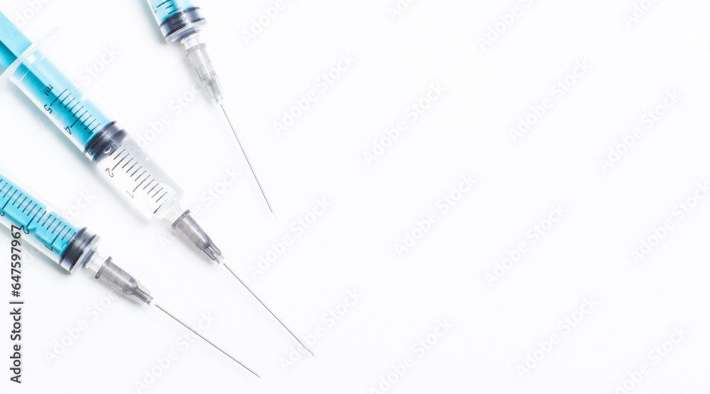 Disposable plastic syringe prepared for injection and vaccination in the hospital. The concept of medicine and health Disposable plastic syringe prepared for injection and vaccination in the hospital. The concept of medicine and health
