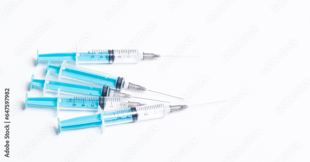 Disposable plastic syringe prepared for injection and vaccination in the hospital. The concept of medicine and health