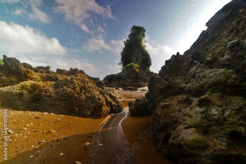 Rock formations, Karang Agung beach, Kebumen, Central Java, Indonesia photo