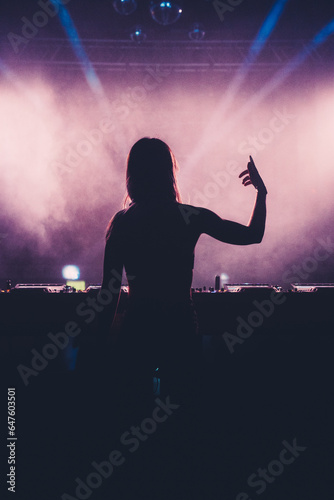 DJ girl mixing at Festival or club