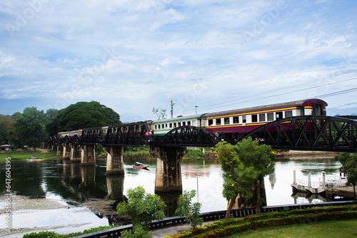 Steel railway bridge over river kwai of landmarks memorials historical sites and monuments World War II Sites for thai people foreign travelers travel visit and train running in Kanchanaburi, Thailand