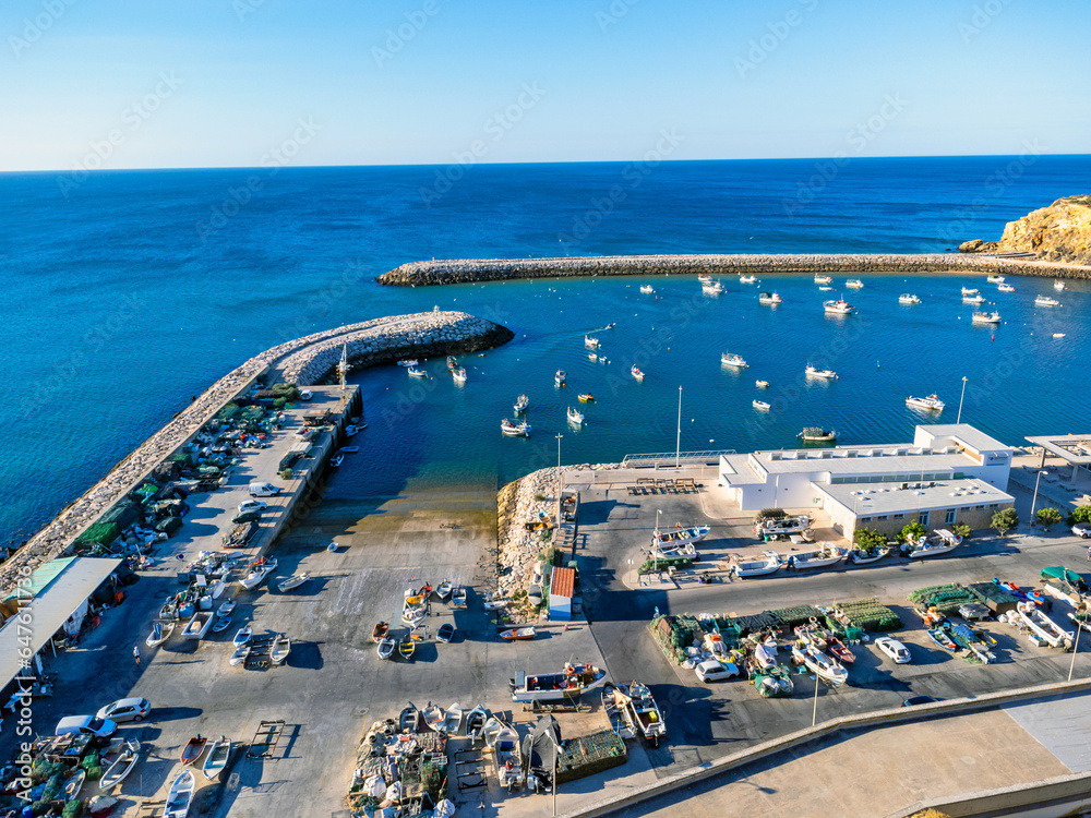Aerial view landscape, view of port in Portugal Albufeira, fishing boats, waterfront marina.