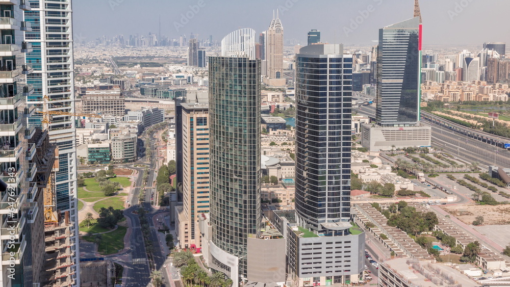 Obraz premium Aerial view of media city and al barsha heights district area all day timelapse from Dubai marina.