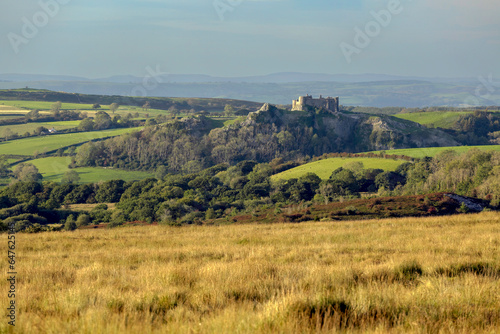 Carreg Cennen castle sitting high on a hill near the River Cennen in the village of Trapp, four miles South of Llandeilo in Carmarthenshire, South Wales UK
 photo