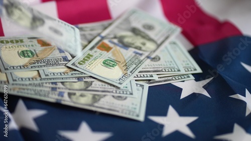 dollar money and American flag. bankrupt man counting money cash. business crisis finance dollar concept. close-up of a hand counting paper dollars. exchange finance economy dollar usd pay tax
