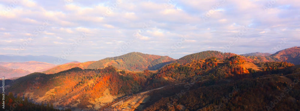 Colorful Canopy: Aerial Perspective of Mountain Fall Foliage