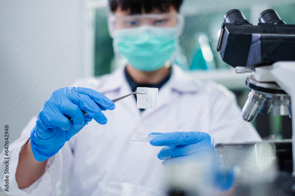 Scientist is doing experiment or study with aloe vera sample in plant laboratory. Concept of medical, herbal skin care, cosmetic, biology, pharmaceutical and biochemistry research. Genetic discovery. Scientist is doing experiment or study with aloe vera sample in plant laboratory. Concept of medical, herbal skin care, cosmetic, biology, pharmaceutical and biochemistry research. Genetic discovery.