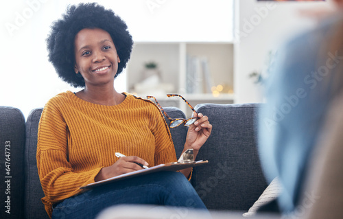 Bild auf Leinwand Psychologist on couch, writing notes with patient, advice and help in psychology, listening and mental health care