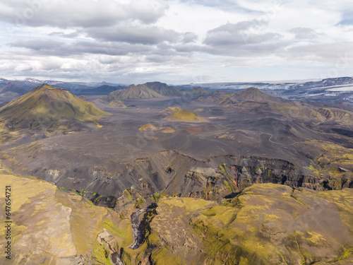 Aerial view of the Markarfljotsgljufur canyon with mountains in background, Hvolsvollur, Southern Region, Iceland. photo