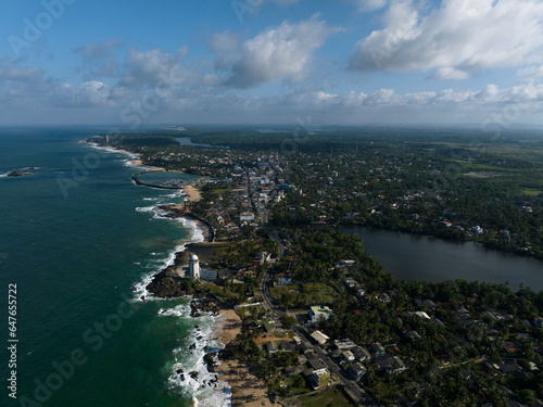 Aerial view of the beach, sea and lagoon in Hikkaduwa, Sri Lanka. photo