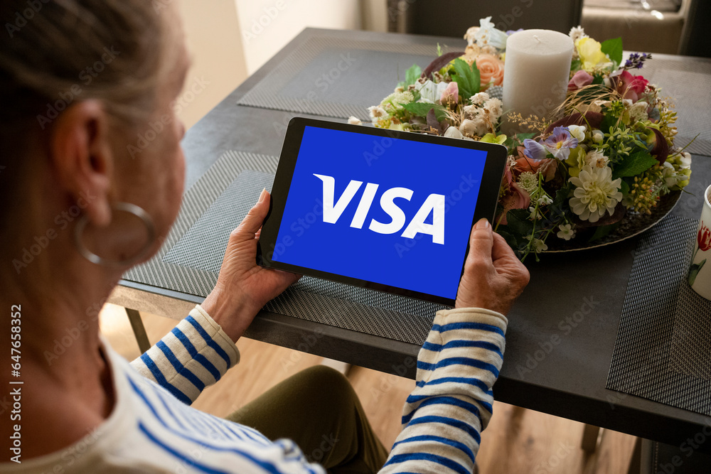Visa Card Bank Logo Tablet Display Frau Hand halten Stock Photo | Adobe ...