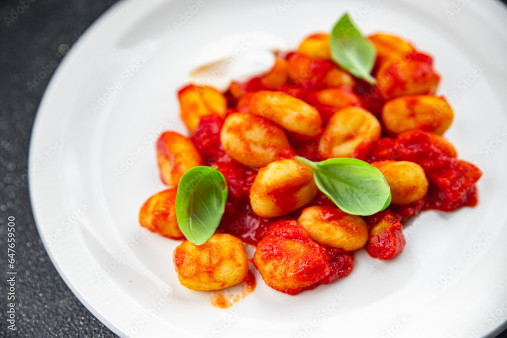 gnocchi potato dish tomato sauce no meat appetizer meal food snack on the table copy space food background rustic top view  