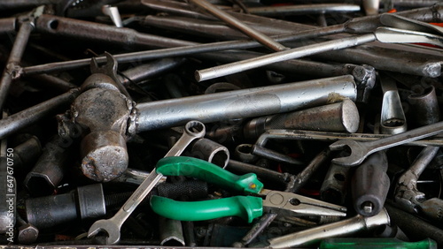 Various tools for repair in a workshop, closeup of photo.