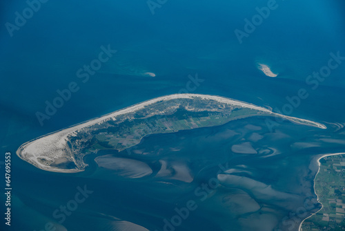 Aerial landscape view of Amrum Island, part of North Frisian Islands in Nordfriesland district with settlements on east coast and the largest village Nebel. 