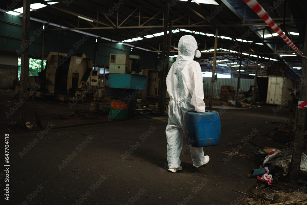 Workers in protective suits and gas masks handle hazardous chemicals. Find ways to prevent it from causing harm to the factory.