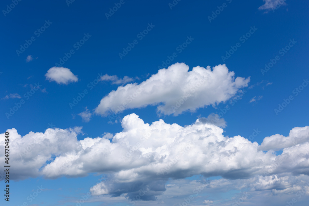 White Clouds on Blue Sky Background.
