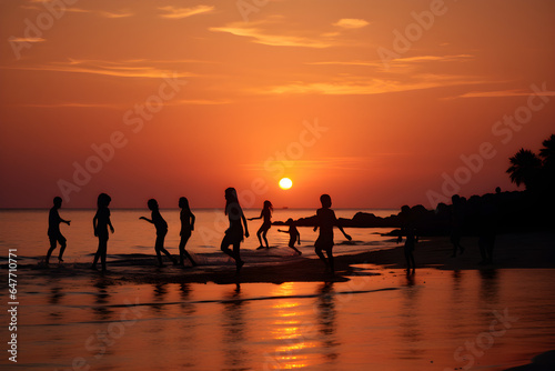 silhouettes of people on the beach