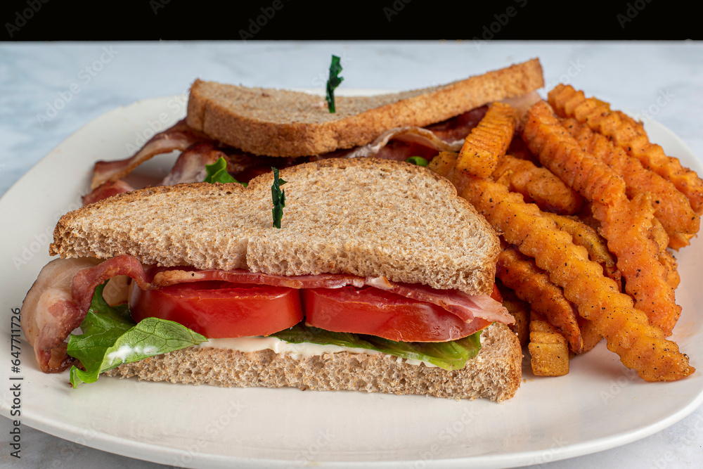 blt on wheat bread with sweet potato fries blt on wheat bread with sweet potato fries
