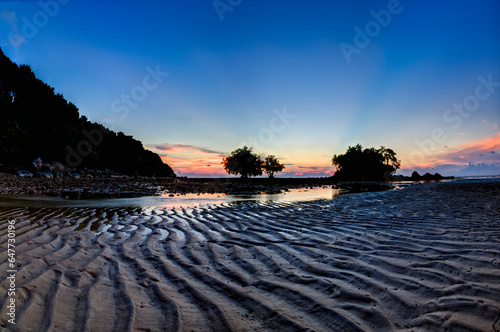 Sunset At Nai Yang Beach; Phuket Thailand photo