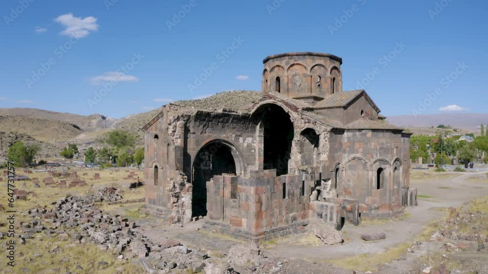 Tilt down aerial shot of Talin Cathedral on sunny summer day. Talin, Aragatsotn Province, Armenia. Tilt down aerial shot of Talin Cathedral on sunny summer day. Talin, Aragatsotn Province, Armenia.