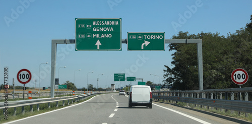 Road sign on the highway with the Italian places such as Milan Turin and More