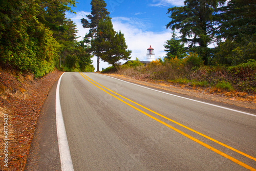 Umpqua River Lighthouse And A Two Lane Road; Oregon, United States of America photo