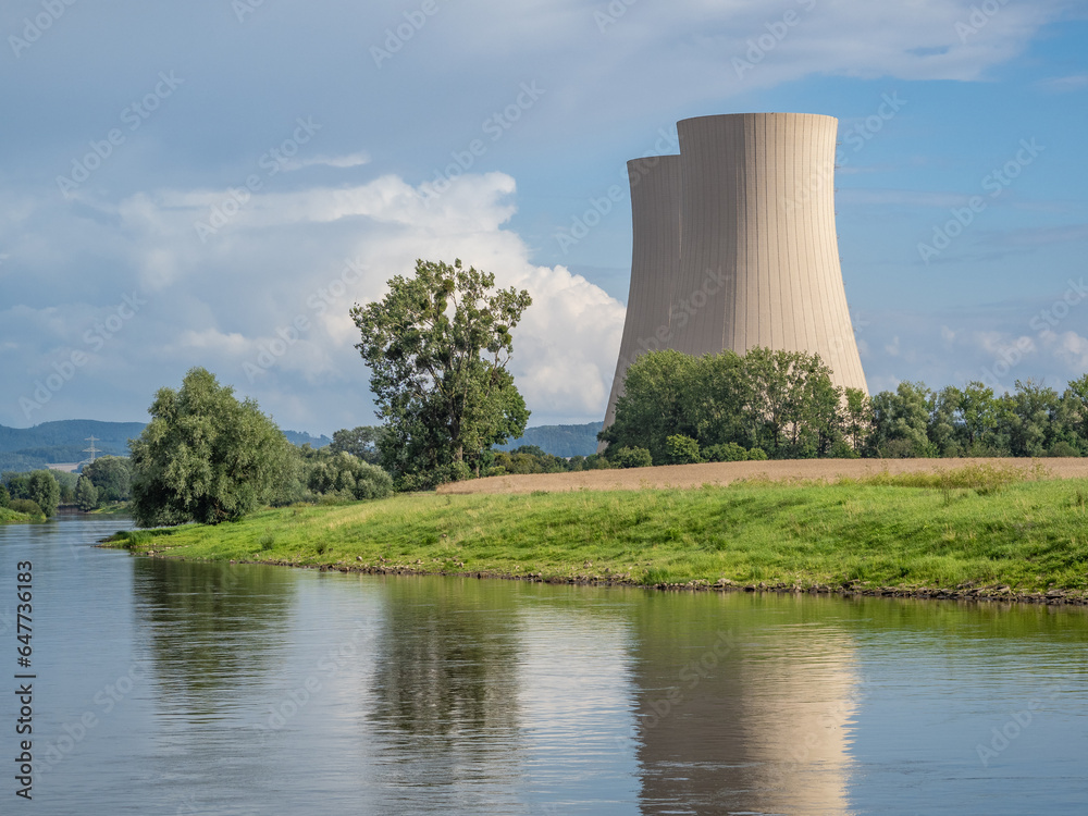 Green landscape and nuclear power plant . Green landscape and nuclear power plant .