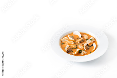 Seafood soup plate isolated on white background. Copy space