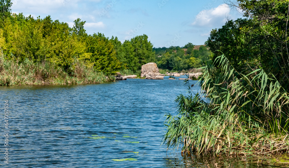 Natural landscape, the bed of the Southern Bug river with granite rifts in the Nikolaev region Natural landscape, the bed of the Southern Bug river with granite rifts in the Nikolaev region
