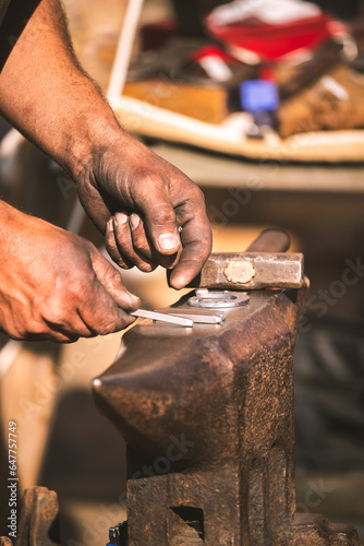 Blacksmith working on a anvil