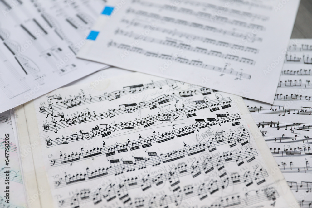 Sheet music notes on paper, artistic composition, musical harmony, creativity Sheet music notes on paper, artistic composition, musical harmony, creativity