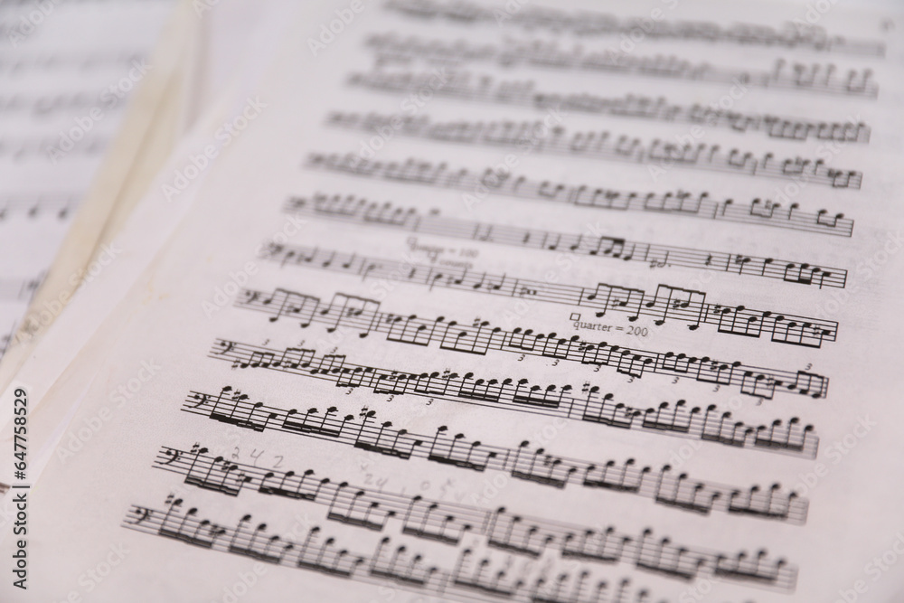 Sheet music notes on paper, artistic composition, musical harmony, creativity Sheet music notes on paper, artistic composition, musical harmony, creativity