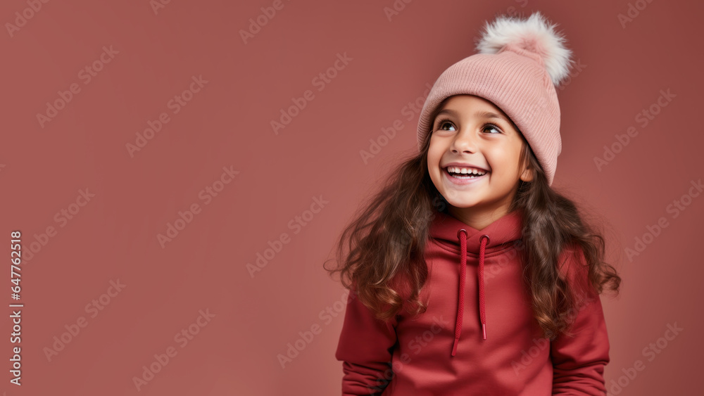 Latin girl smile in santa claus red hat, Christmas background design Latin girl smile in santa claus red hat, Christmas background design