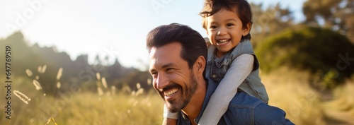 Portrait of happy father and smiling son embracing together. © Virtual Art Studio