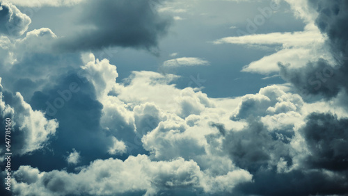 Dark storm clouds with breaking sunlight. © freeman83