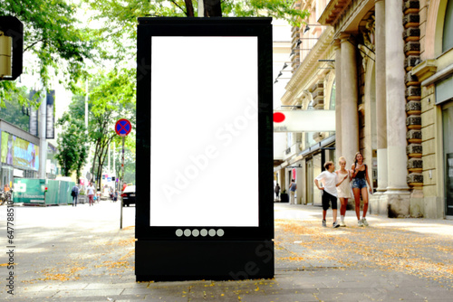 billboard on busy street. blank white poster and advertiser ad space. digital outdoor display lightbox. base for mockup. empty display panel. soft streetscape. urban shopping alley background