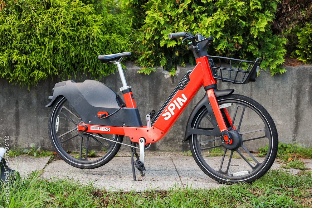 Chicago, IL, USA, Sept, 14, 2023, electric scooters and bicycles, showcasing the convenience and