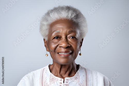 Beautiful senior black afro american woman on white background