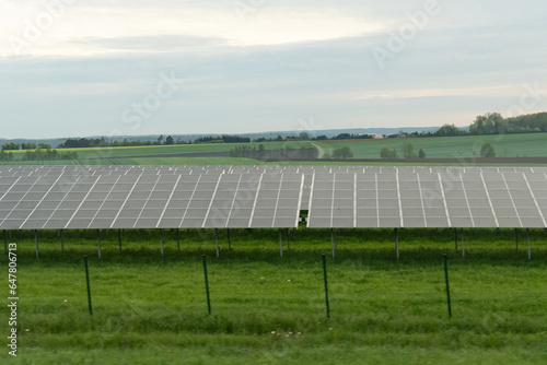 Wallpaper Mural Solar panels of a power plant on a green field Torontodigital.ca