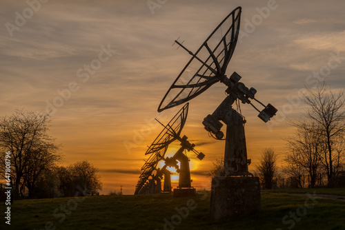 Old radar station in sunset