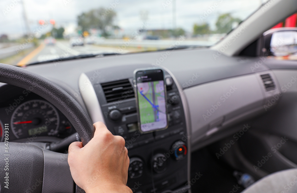 hand grips a car steering wheel, symbolizing safe and controlled driving, with a focus on responsibility and road safety hand grips a car steering wheel, symbolizing safe and controlled driving, with a focus on responsibility and road safety
