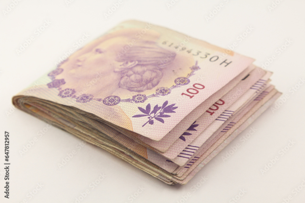 Argentine Money, Pile of 100 Pesos argentinos, Bills Currency of Argentine Argentine Money, Pile of 100 Pesos argentinos, Bills Currency of Argentine