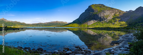 Stunning fjord lansdcapes along the coast of the island of Flakstad, Lofoten Islands, Nordxland, Norway